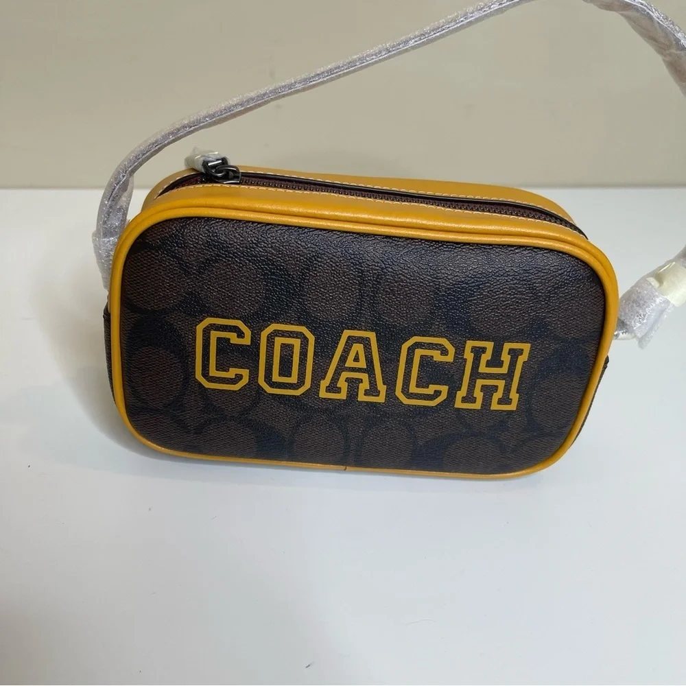 Coach Jamie Wristlet In Signature Canvas With Varsity Motif